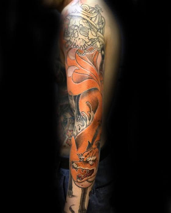 full-arm-kitsune-fox-male-tattoo-design-ideas.jpg